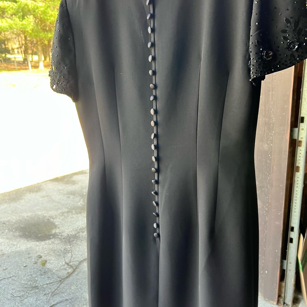 Black dress with sequence on the sleeves